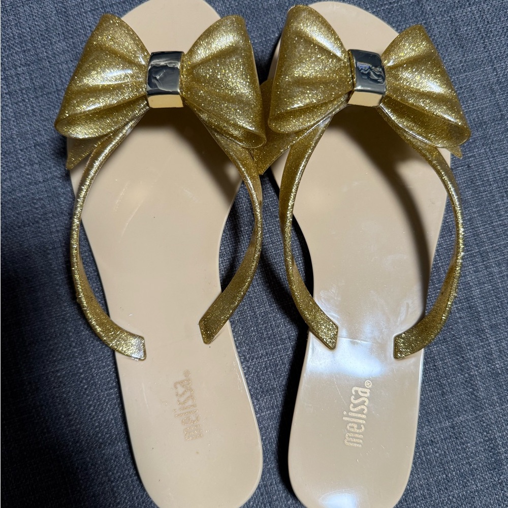 Melissa Harmonic Xlll Bright Gold Glittering Bow Jelly Sandals